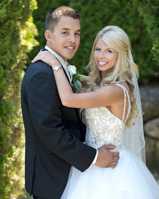 Bride and groom on wedding day after giving I pick you for the rest of my life keychain