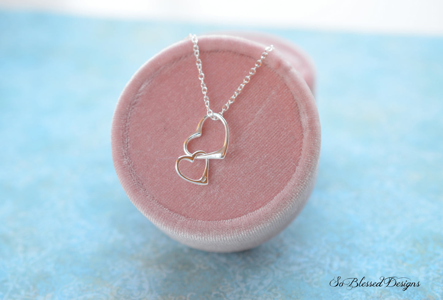 Sterling silver heart necklace on display