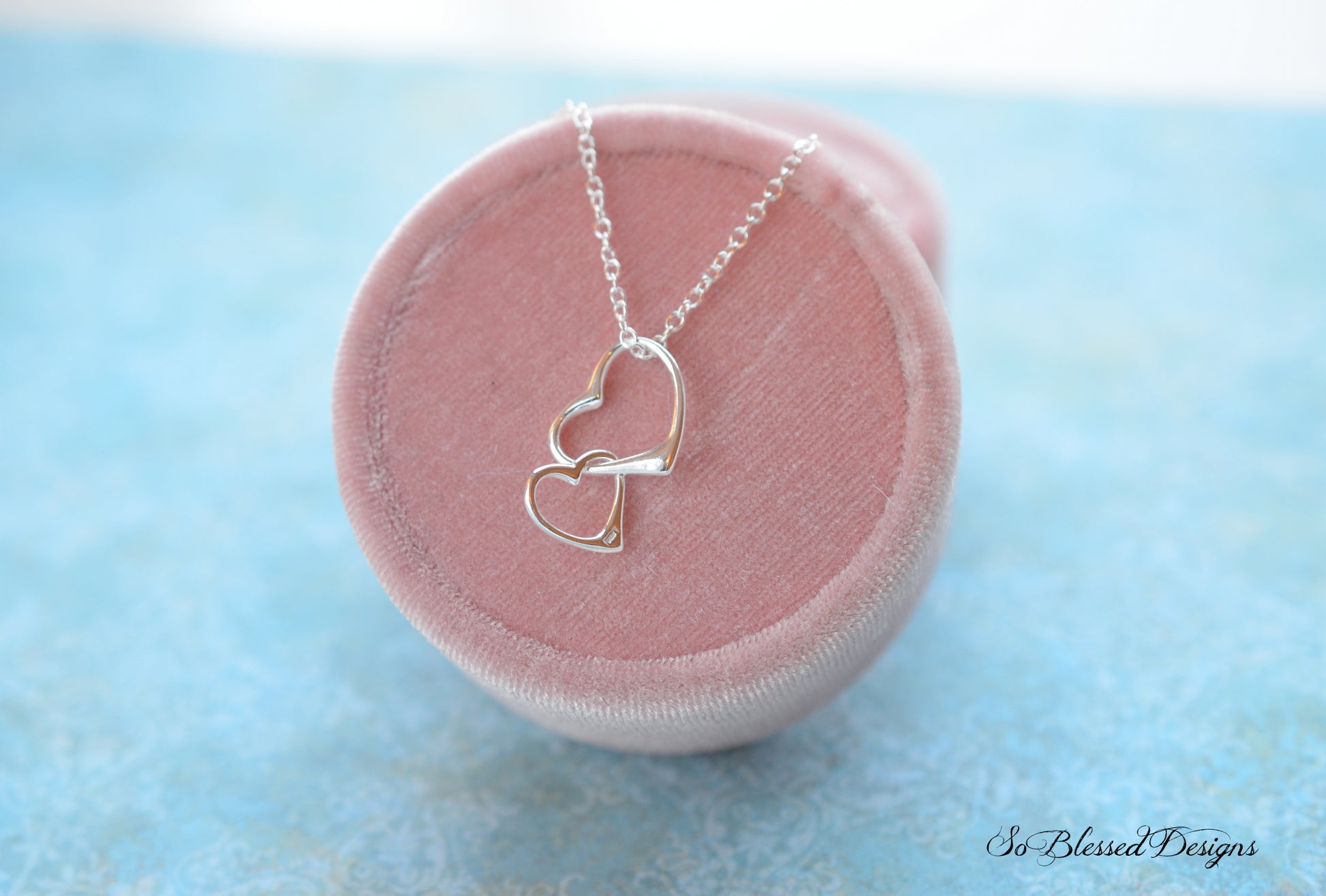 Sterling silver heart necklace on display