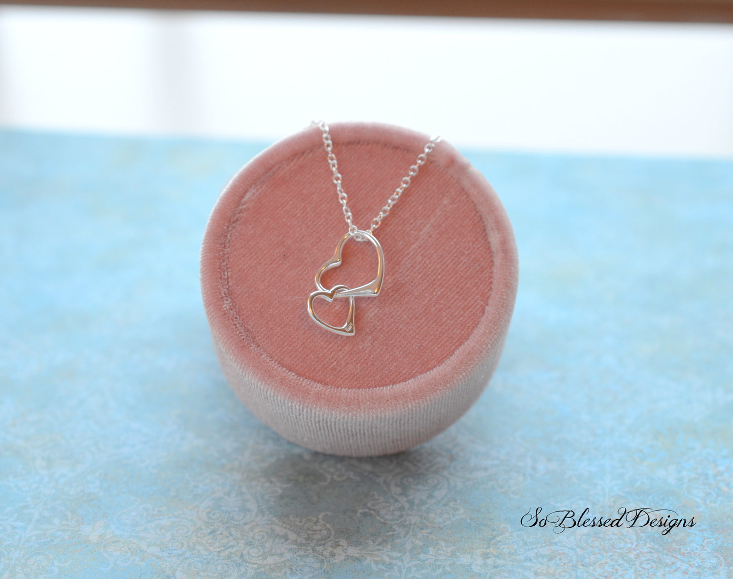 Connected sterling hearts necklace 