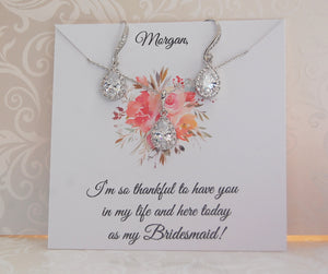 Silver bridesmaid jewelry set on personalized card