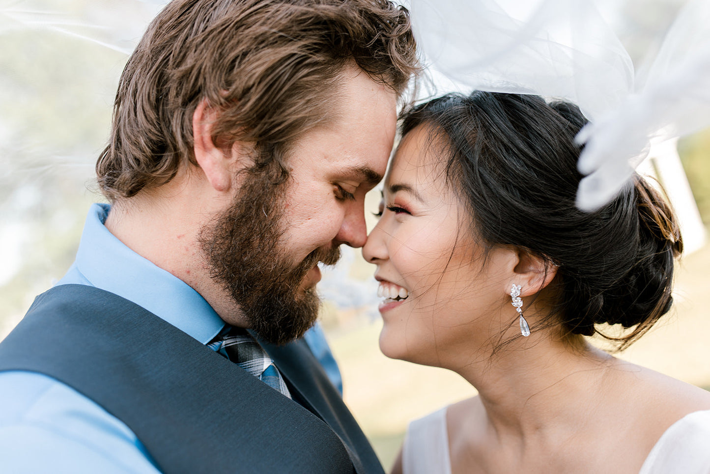 Bride showing her groom new earrings