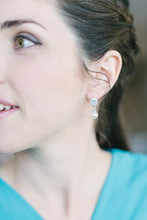 bridesmaid wearing pearl drop earrings