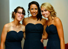 Bridesmaids wearing their infinity pearl necklaces for wedding 