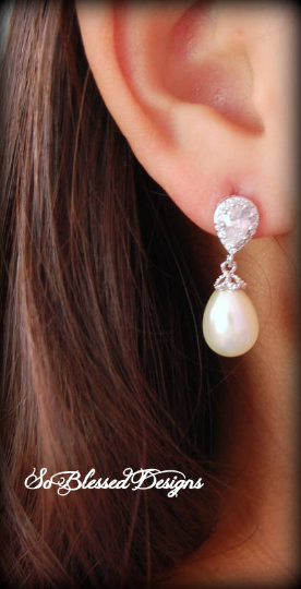 bridesmaid wearing pearl and cz drop earrings 