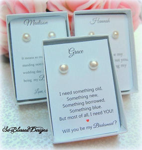 Pairs of white pearl stud earrings for bridesmaids