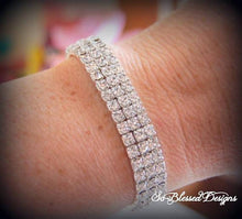 Bridesmaid wearing cubic zirconia bracelet for wedding jewelry