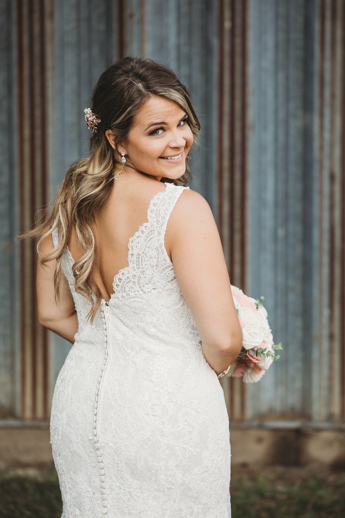 Bride looking beautiful in CZ teardrop bridal earrings
