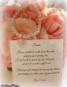 Personalized mother of the groom pearl bracelet displayed on thank you jewelry card
