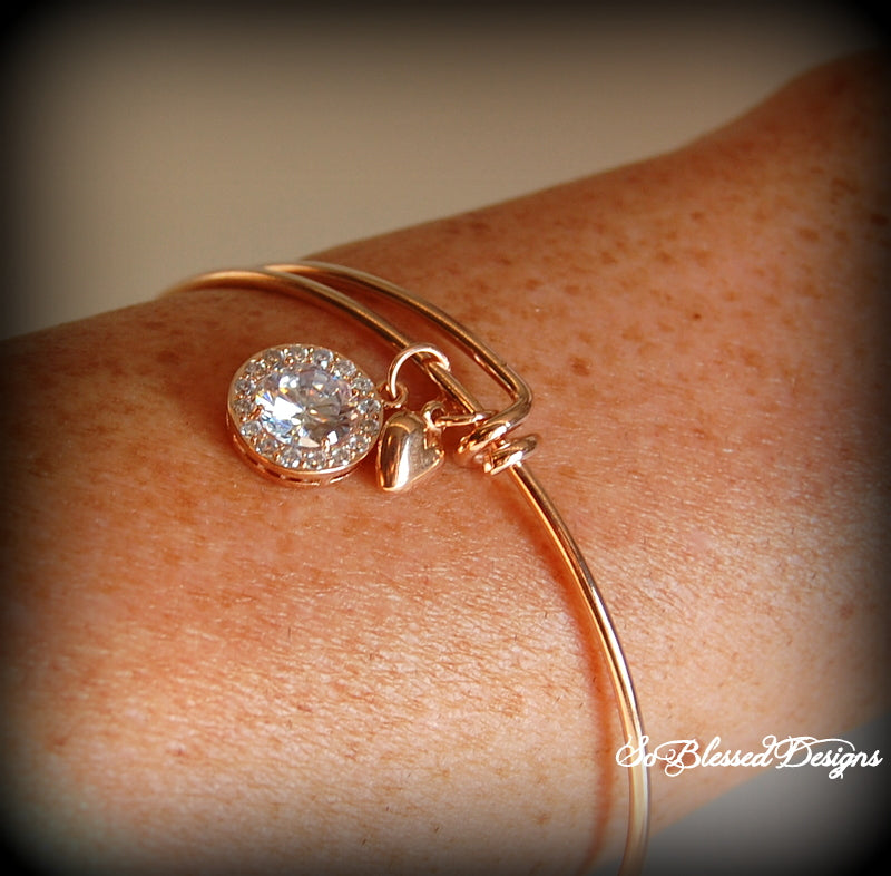 Motherof the groom wearing rose gold cubic zirconia bracelet