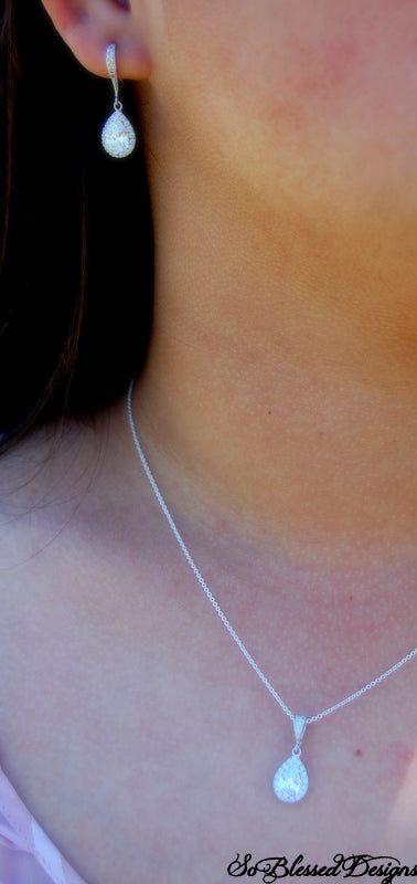Bridesmaid wearing necklace and earrings for wedding jewelry