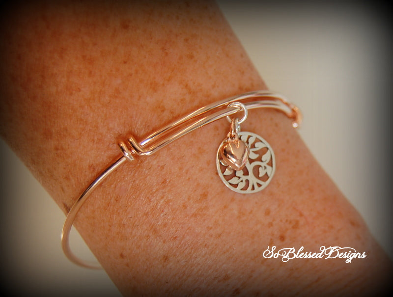 New sister in law wearing rose gold family tree bracelet