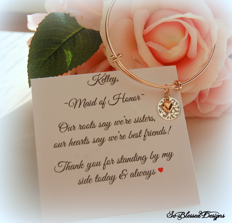 Rose gold family tree bracelet on custom jewelry card 