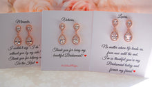 Sets of rose gold earrings with personalized bridesmaid cards