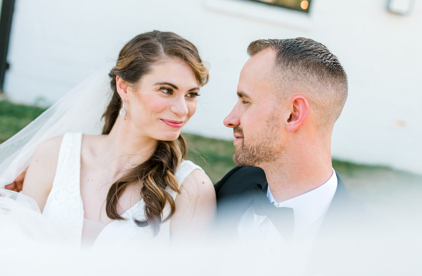Bride wearing timeless wedding earrings