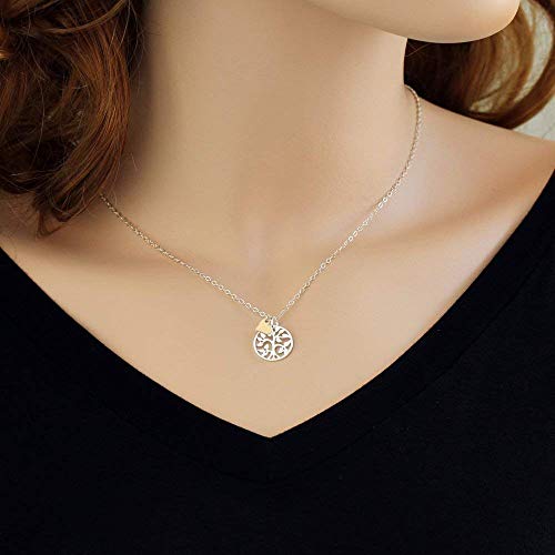 model wearing family tree necklace with rose gold heart