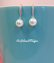 white pearl drop earrings with cubic zirconia ear wires