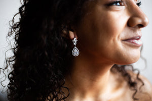 Marquise shaped bridal earrings on bride