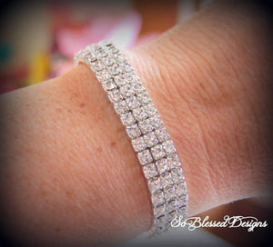 Lady wearing silver cubic zirconia bracelet for bridesmaids