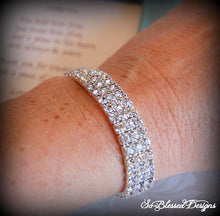 Bridesmaid wearing 3 row silver cz bracelet 