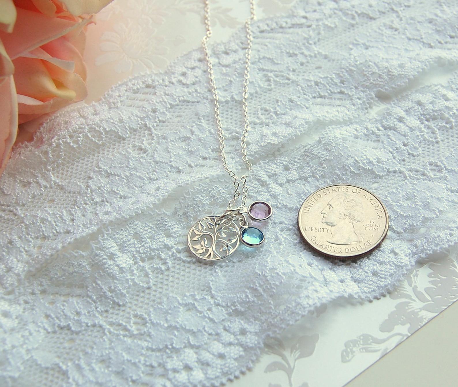 mother of groom necklace next to quarter for size reference
