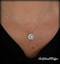 Mother of the Groom wearing beautiful solitaire necklace at sons wedding