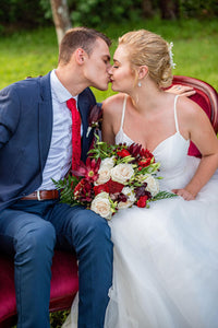 bride kissing groom during wedding