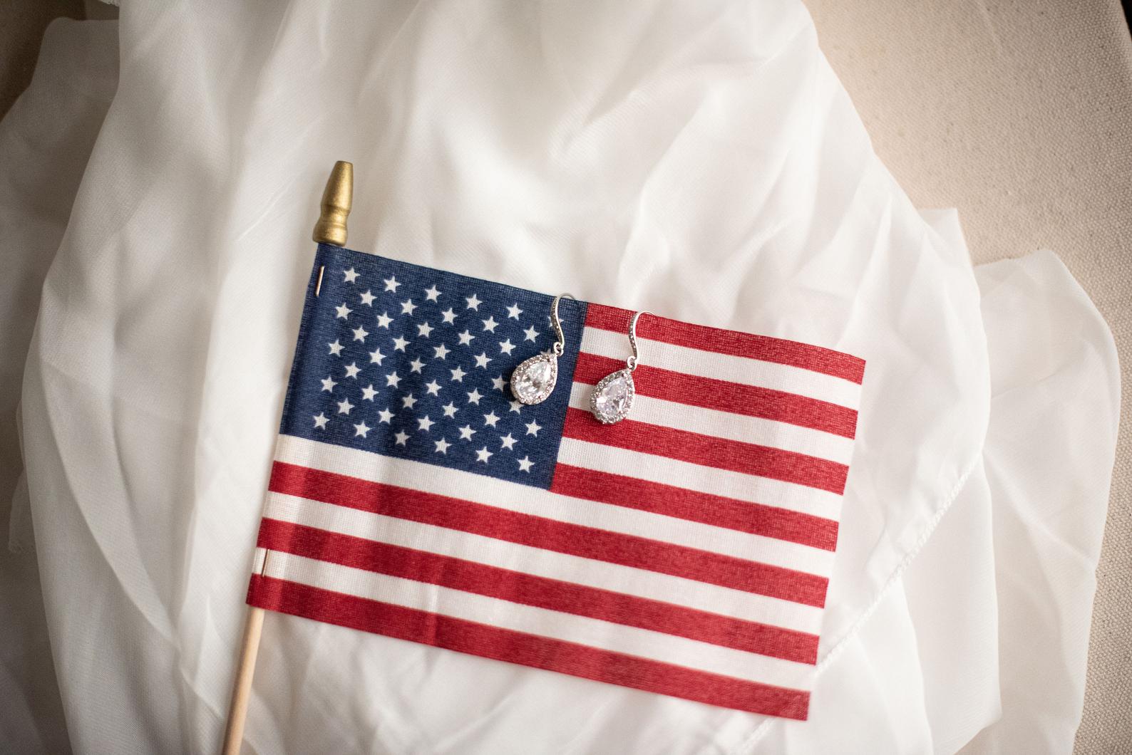 silver teardrop earrings on display