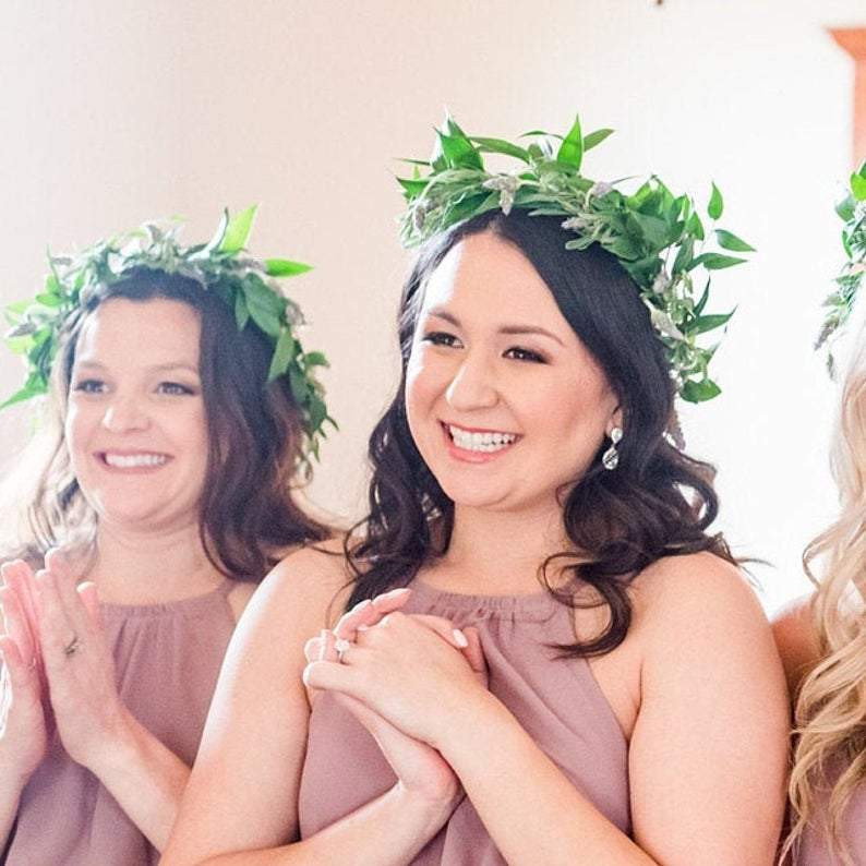 Bridesmaids wearing silver teardrop wedding earrings