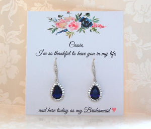 Dark blue earrings on personalized bridesmaid card