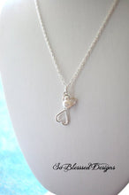 Sterling silver double hearts necklace with pearl accent 