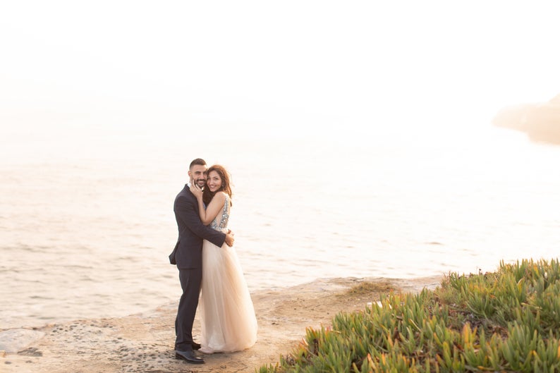 Bride and groom posing on wedding day