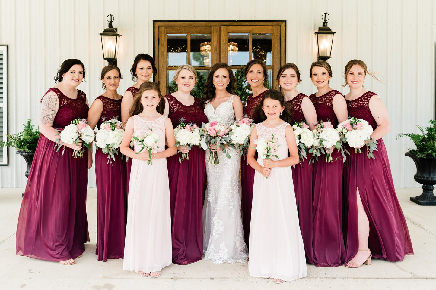 bridal party wearing silver teardrop dangle earrings