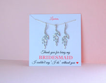crystal earrings displayed on a bridesmaid jewelry card