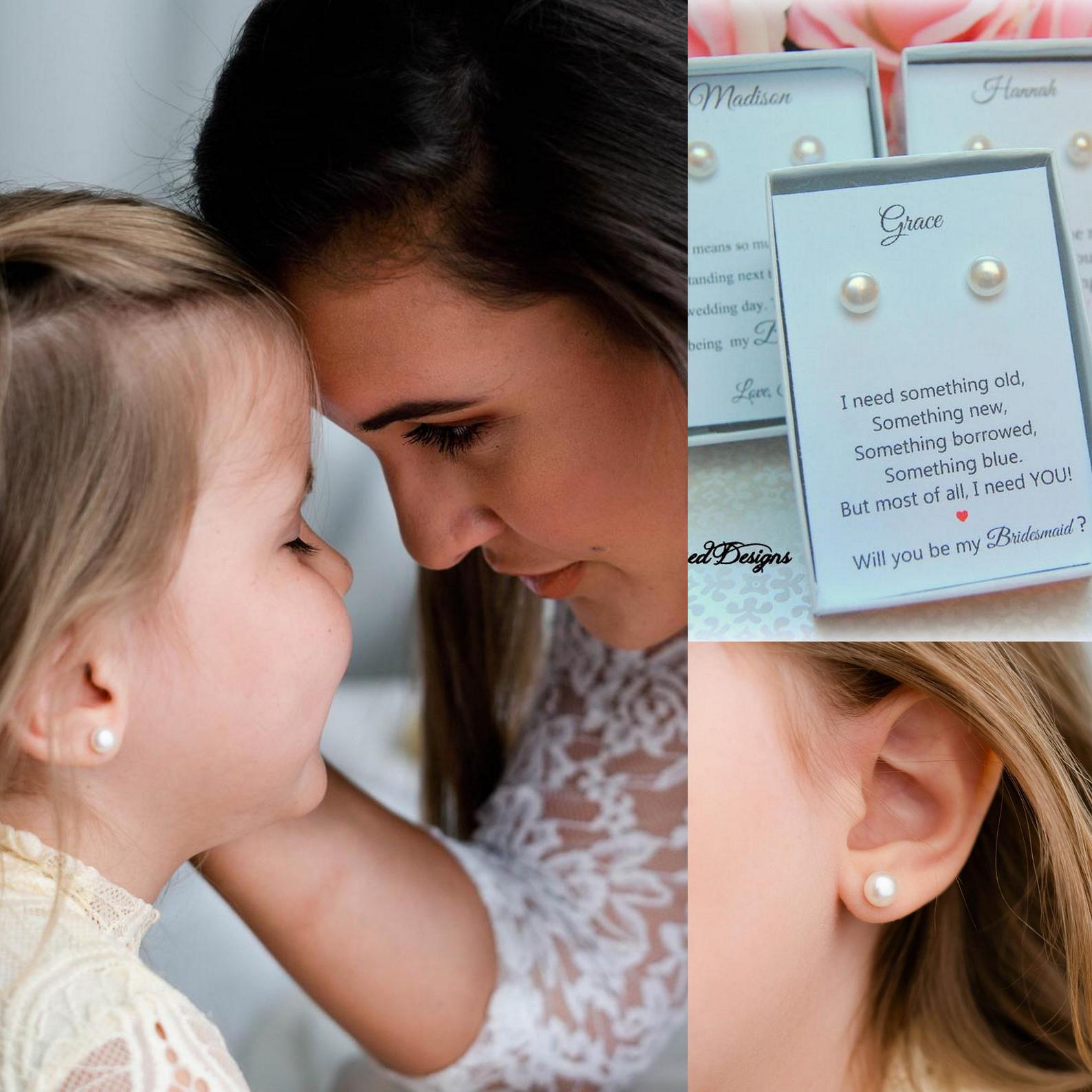 Flower girl wearing pearl earrings with bride