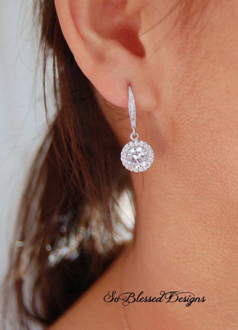bridesmaid wearing CZ solitaire earrings