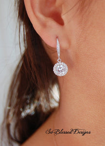 bridesmaid wearing CZ solitaire earrings