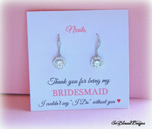personalized jewelry card with earrings attached 