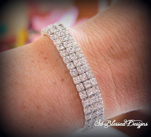 Mother of groom wearing silver and cubic zirconia bracelet