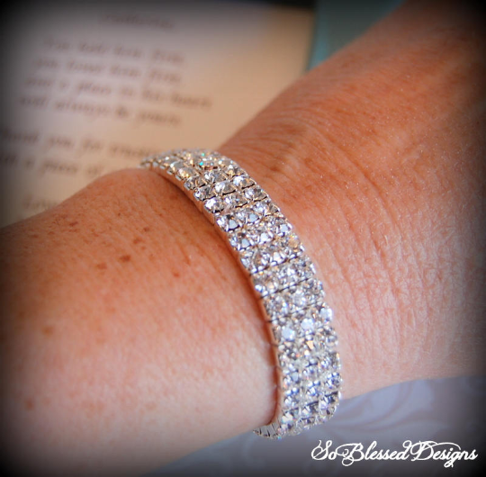 Mother of the bride wearing cubic zirconia bracelet