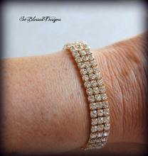 Mother of Groom wearing gold cz bracelet