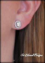bridesmaid wearing silver solitaire earrings on wedding day